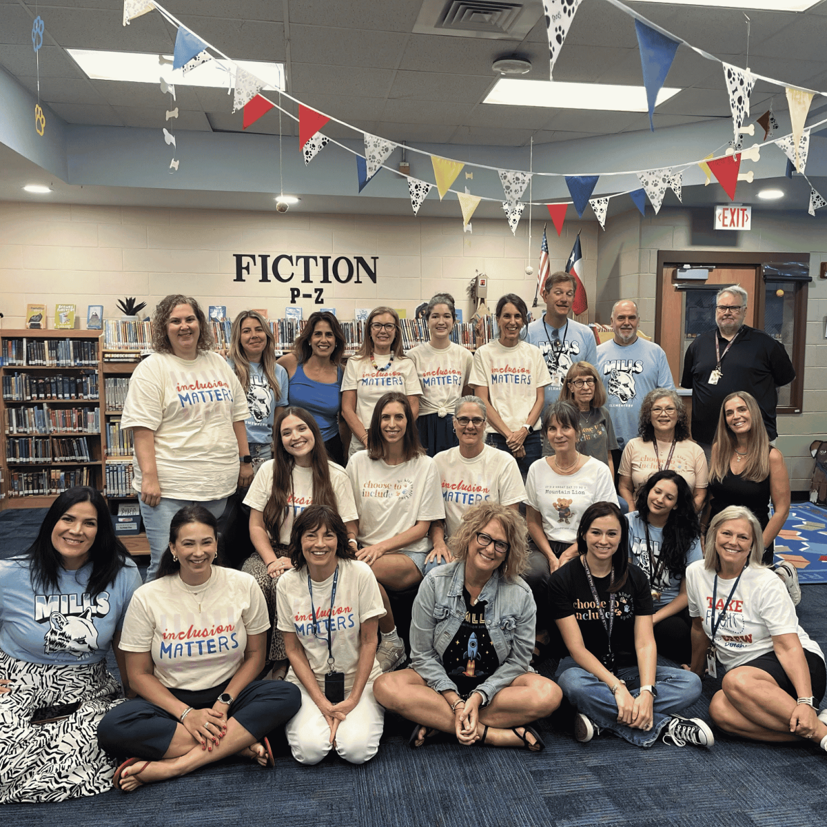 Mills Elementary Special Education and Resource teams posing in the Mills Library